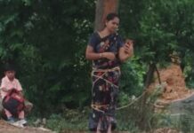 అప్పు తీర్చలేదని మహిళను చెట్టుకు కట్టేసి