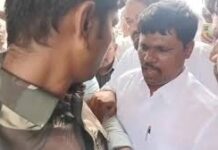 పోలీస్ ను కొట్టిన మంత్రి సోదరుడు